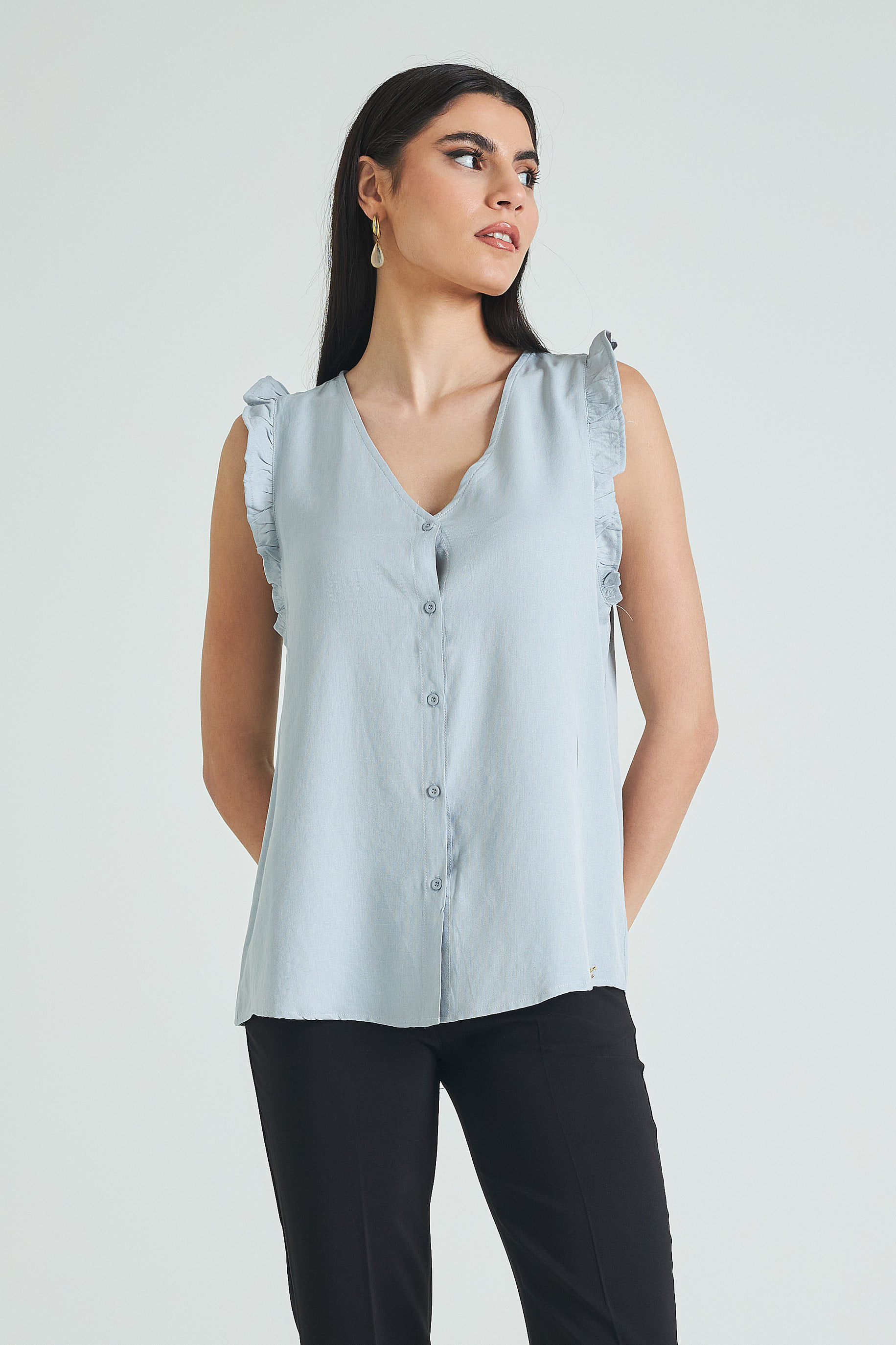 Picture of Sleeveless blouse with buttons