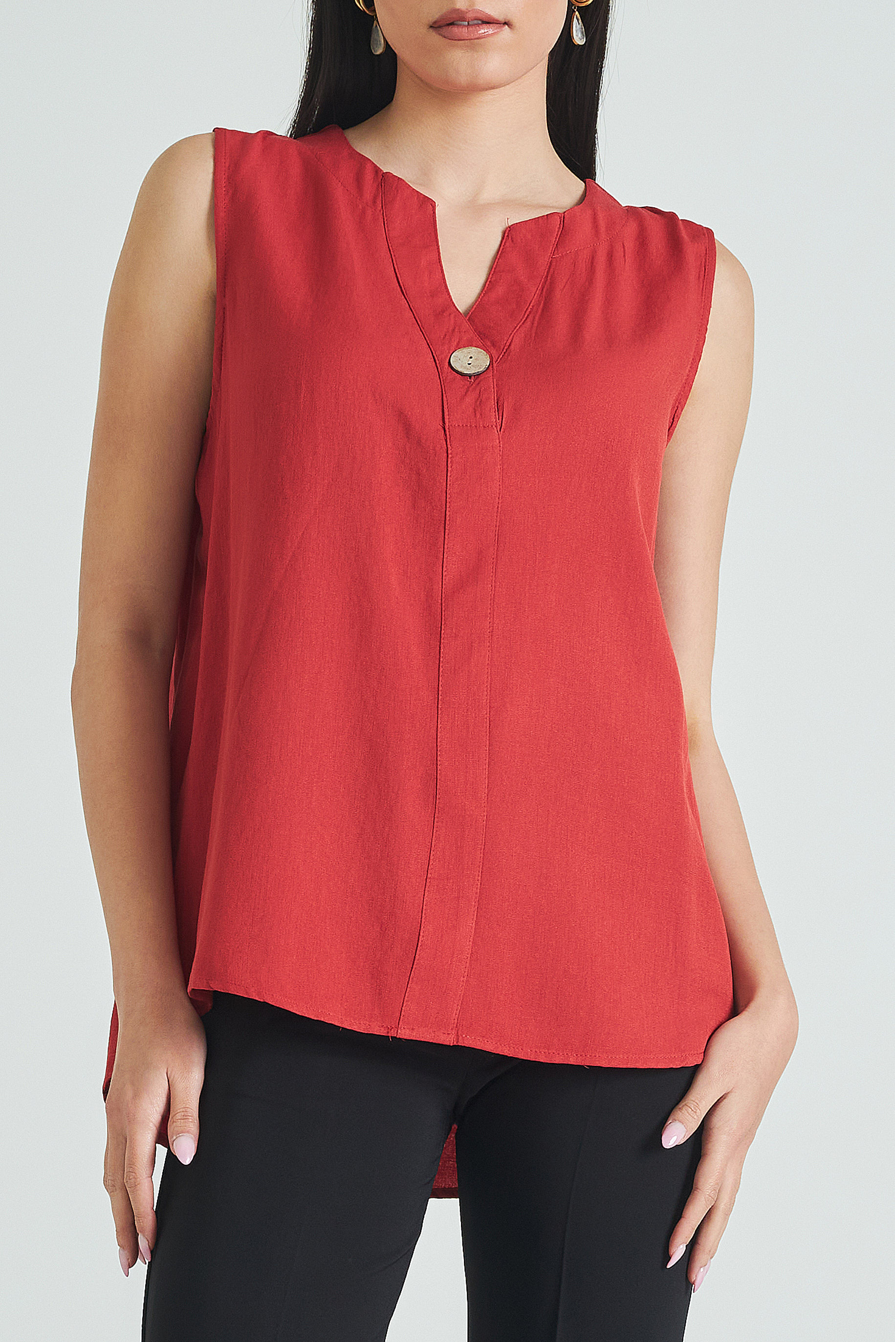 Picture of Sleeveless blouse with button