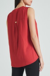 Picture of Sleeveless blouse with button