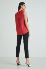 Picture of Sleeveless blouse with button