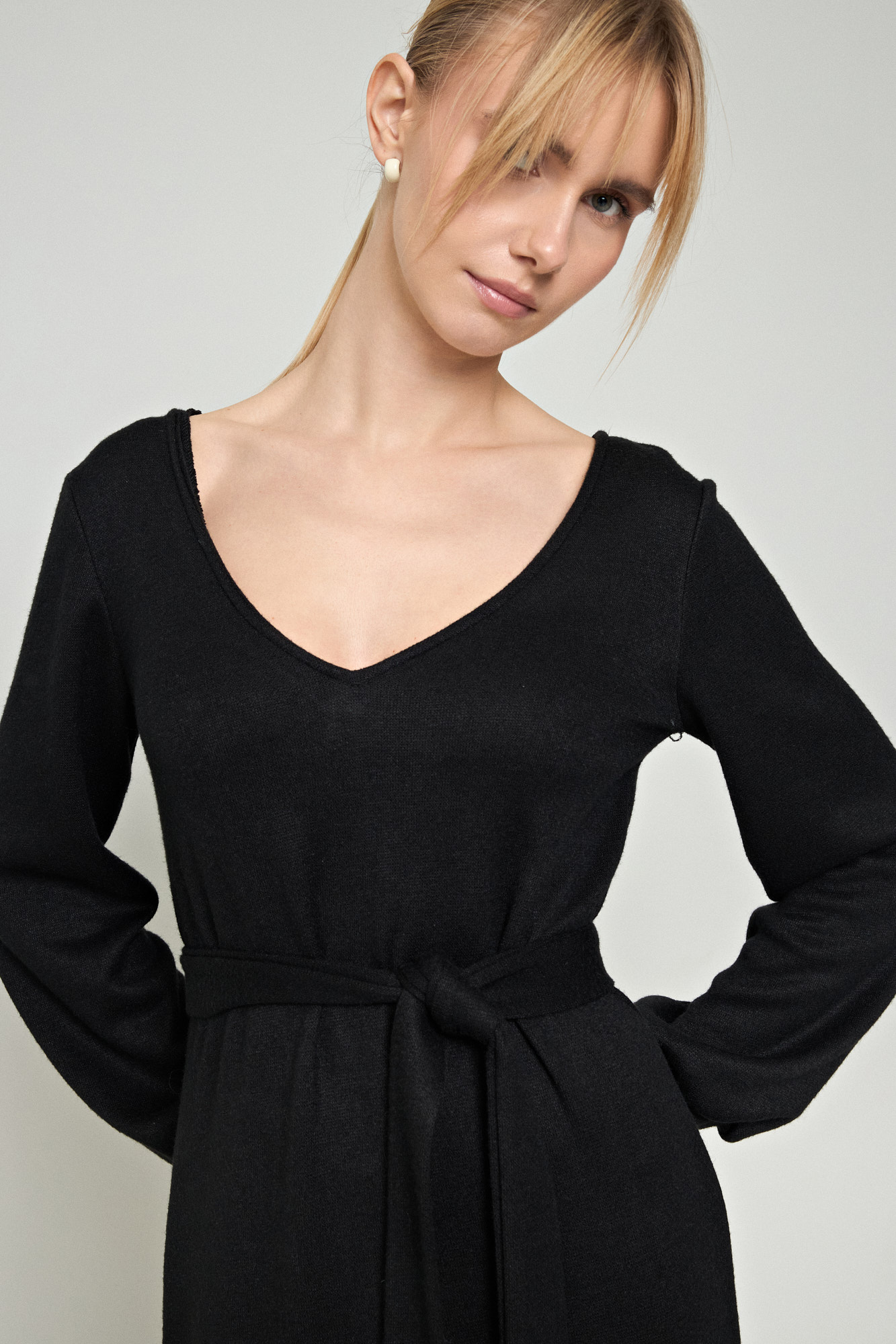Picture of V-neck knit dress with opening