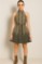 Picture of Sleeveless mini dress with high neck and belt at the waist