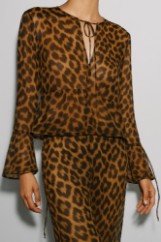 Picture of Silky touch translucent blouse with bell sleeves