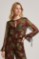 Picture of Silky touch translucent blouse with bell sleeves